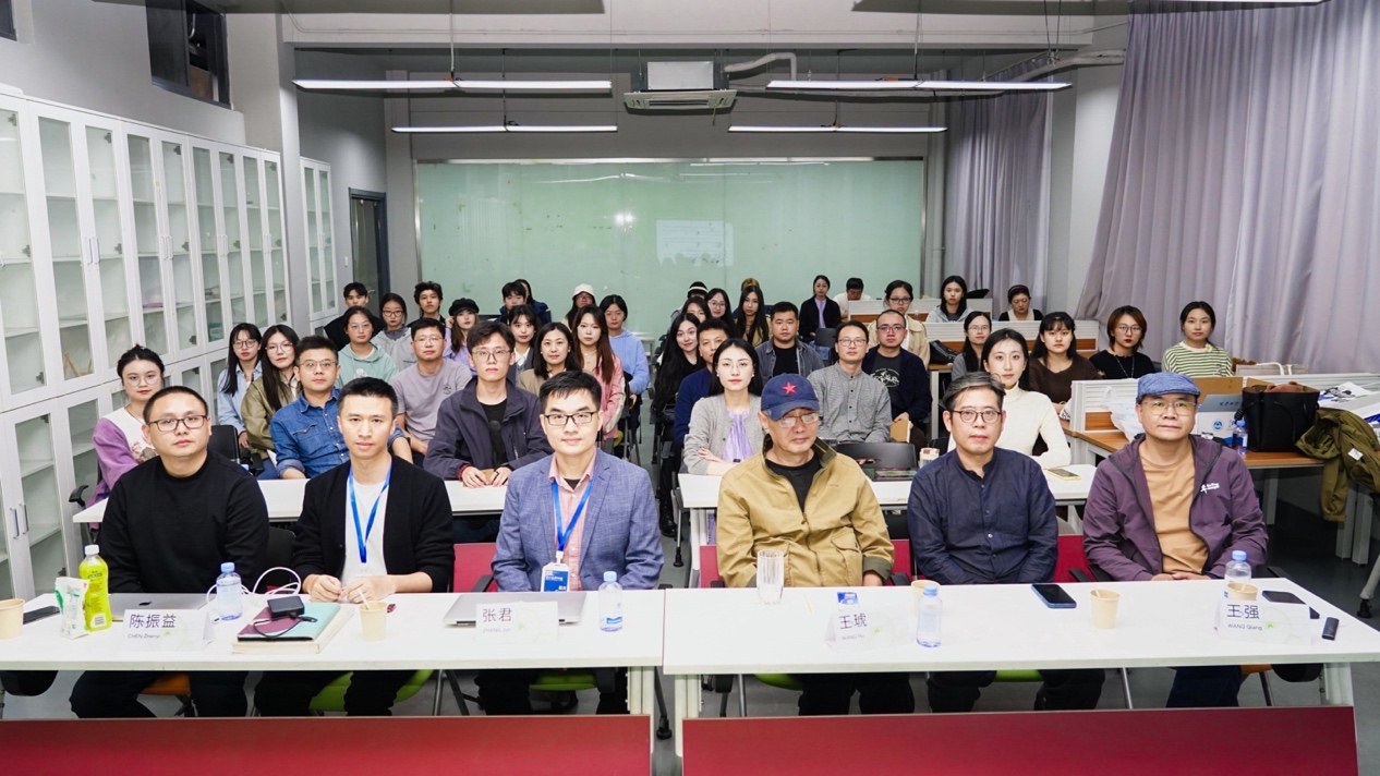 Participants posing together in the conference room.